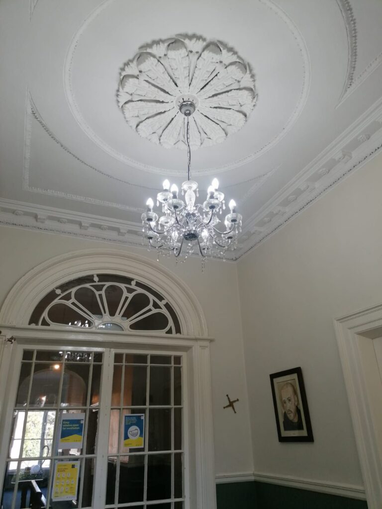 a chandelier from the ceiling
