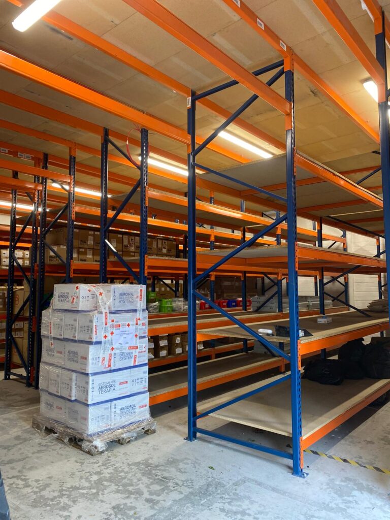 a warehouse with boxes on shelves